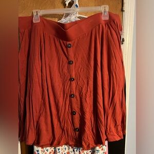 Rust colored knit skirt (faux buttons down the front)